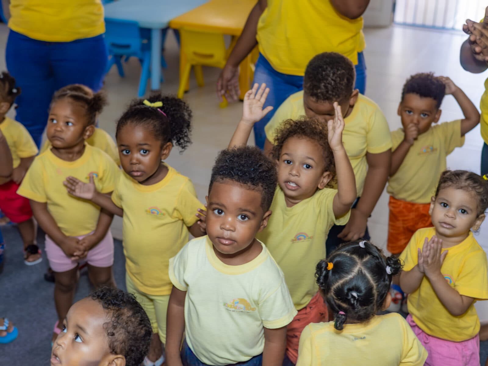 A group of children gathered together during morning circle time